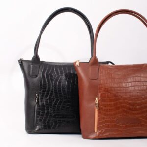 Stylish black and brown leather handbags with crocodile texture on a white background.